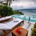 Badian Island Wellness Resort infinity pool with loungers overlooking the ocean in Badian