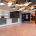 Premier Inn Karlsruhe City Am Wasserturm reception desk with modern pendant lights in Karlsruhe