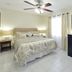 Hollywood by the Sea Hollywood bedroom with king bed, ceiling fan, nightstands and dresser