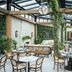 The Gleneagles Hotel in Auchterarder conservatory dining area with glass roof and greenery