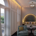 The Clements Hotel Cambridge suite with arched bed alcove, seating area and mirror