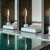 La Réserve Resort, Knokke Heist: indoor pool beside minimalist lounge beds and floor lamps