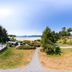 Best Western Plus Tin Wis Resort in Tofino with oceanfront lawns, gravel paths, and guest buildings