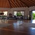 Ocean Beach Resort & Spa in Malindi lobby with open wooden roof, seating area, and tropical garden views