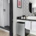 Wimberley Inn, Wimberley: bathroom with walk-in shower, vanity, mirror, and mini fridge