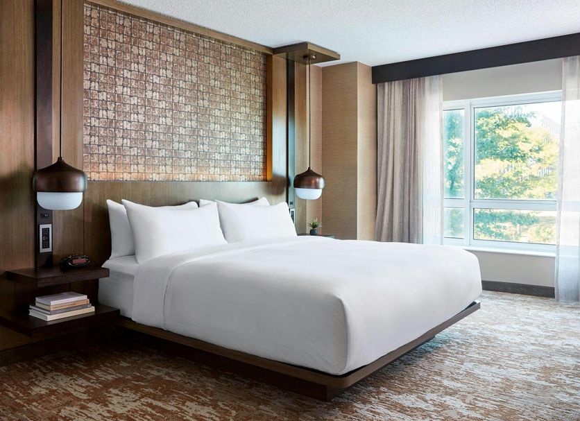 Chicago Marriott Southwest at Burr Ridge guest room with king bed and large window view in Burr Ridge