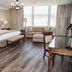 Haywood Park Hotel, an Ascend Collection Hotel in Asheville: spacious guest room with sitting area and city views
