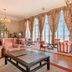 Pousada Viana do Castelo lounge with ornate seating and large windows overlooking Viana do Castelo