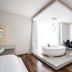 Be Playa Hotel Boutique & Rooftop Bar - Adults Only in Playa del Carmen: loft suite with freestanding tub and lounge chairs