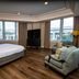 Haywood Park Hotel, Asheville guest room with city views, king bed, TV, and seating area