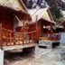 Relax Beach House in Ko Lanta: rustic bamboo beach bungalows with thatched roofs and small porches