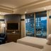Four Points by Sheraton Izmir room with city and sea views, balcony, and two beds