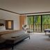 Aman Rosa Alpina room in Badia/Abtei with balcony doors and forest view