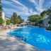 Westgate Branson Lakes Resort in Hollister with outdoor pool and rock waterfall landscape