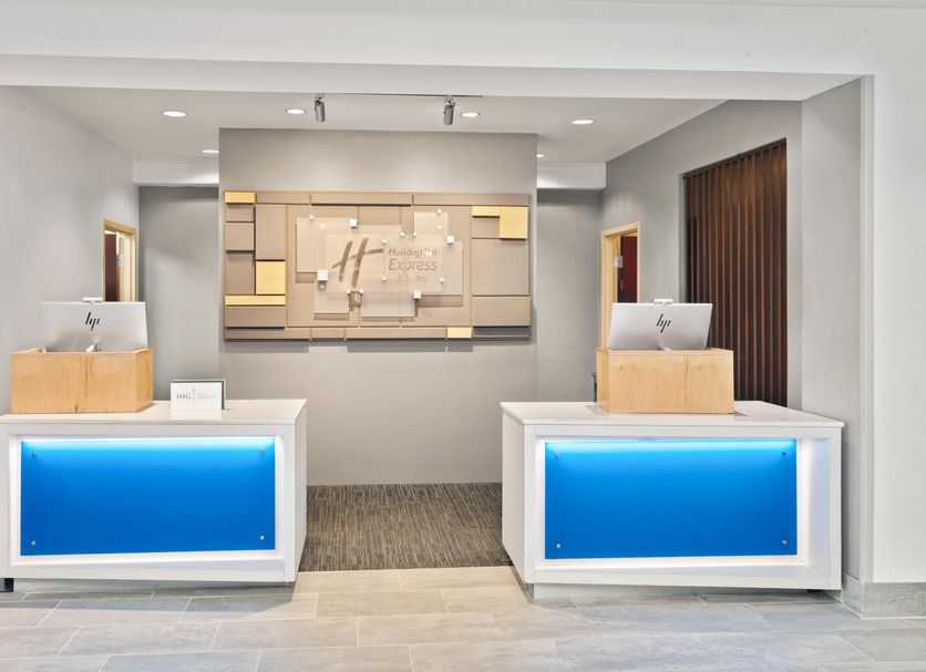 Holiday Inn Express & Suites Chicago West-O'hare Arpt Area lobby with dual front desks in Hillside