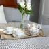 The Langworthy Inn & Winery, Westerly: tea tray with teacups and vase of flowers on a bed