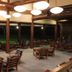 Towada Prince Hotel in Kosaka lounge with chairs and hanging lights overlooking a dark lawn