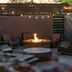 Courtyard by Marriott Cleveland Beachwood patio with fire pit and lounge seating at dusk