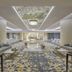 Wirgan Al Noor, Tapestry Collection by Hilton in Jeddah lobby with patterned carpet, chandeliers and seating