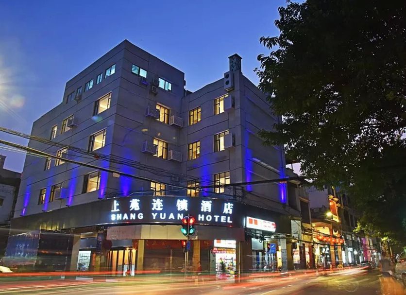 Shang Yuan Hotel Shang Xia Jiu Branch in Guangzhou exterior at dusk with lit facade and street view