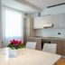 Una Hotels Le Terrazze Treviso Hotel & Residence kitchen and dining area with modern cabinets in Villorba