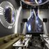 Master Hotel in Huizhou: futuristic lounge with curved seating and large wall display