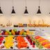 Buffet fruit and pastries at NH Monterrey La Fe in Monterrey with hanging pendant lights