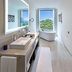 The Oberoi New Delhi bathroom with soaking tub and city-view windows in New Delhi