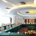 East Garden Hotel Chongqing meeting room with U-shaped conference table and floral centerpiece