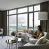 Four Seasons Hotel Bengaluru at Embassy One lounge with floor-to-ceiling windows and city views