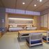 Dantokan Kikunoya in Ōtsu room with two beds and seating area, featuring tatami-style details