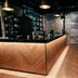 Original Sokos Hotel Rikala lobby in Salo with reception desk, pendant lights and brick walls