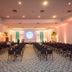 Hotel Embaixador in Porto Alegre conference room with rows of chairs facing a presentation screen