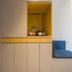 Motel168 Shanghai Qi Bao Inn in Shanghai guest room with built-in cabinet and blue seating nook