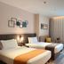 Home Inn Plus Beijing South Station Wanda Plaza in Beijing, twin beds, window light and desk in a modern room