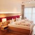 Hotel am Wiesenhang - Garni room in Bad Kohlgrub with double bed and balcony doors