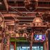 Fiesta Rancho Hotel And Casino Las Vegas restaurant with rustic decor, hanging planters, and TV screens