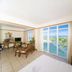 Tianfuyuan Resort Sanya room with balcony view of ocean and pool