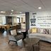 Holiday Inn St Louis Sw - Route 66 lobby seating area with Route 66 wall graphic in St. Louis
