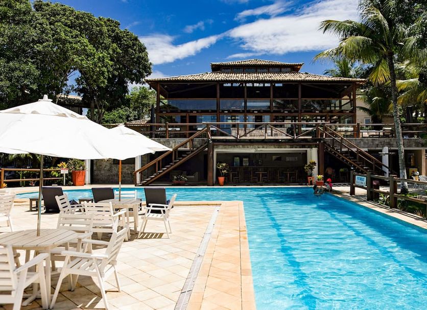 Pousada Pontal da Ferradura in Búzios with outdoor pool, sun loungers and tropical terrace