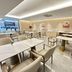 International Haiyuan Resort Hotel in Nantong breakfast room with tables and beige chairs
