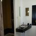 Hôtel En Ville in Aix-en-Provence bathroom with sink vanity and open shower area