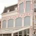 Villahotel Vlissingen in Vlissingen, ornate white hotel façade with curved windows and wrought-iron balconies