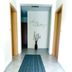 Gästehaus Klug hallway in Sankt Stefan ob Stainz with a blue striped runner and vase