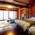 Houraiya in Kamogawa: Japanese-style room with twin beds and tatami area