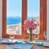 Samira Resort Hotel Aparts & Villas in Kalkan, sea view through window with table and flowers