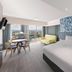 Vibe Hotel Gold Coast in Surfers Paradise, room with ocean-view balcony and city skyline