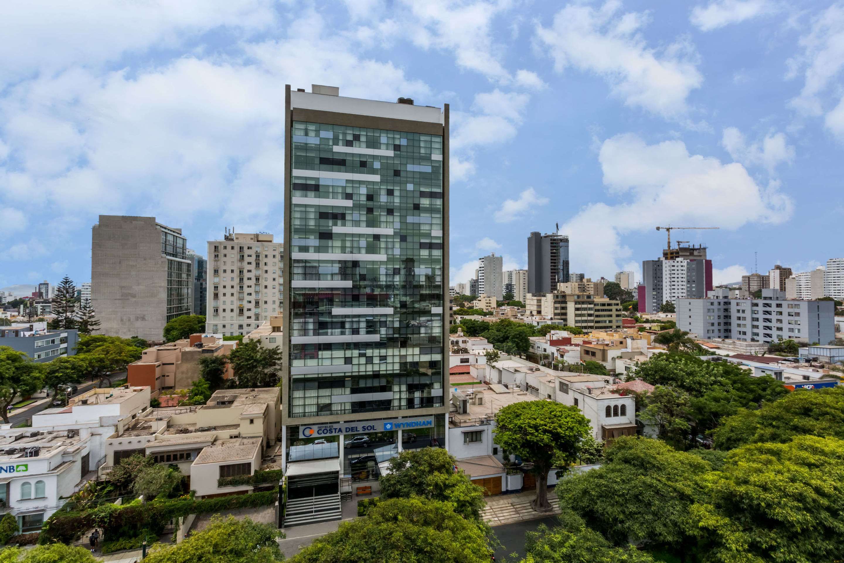 Wyndham Costa del Sol Lima Salaverry high-rise hotel with city skyline view in Lima