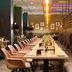 Leonardo Hotel Offenbach Frankfurt dining area in Offenbach am Main with long table and banquette seating