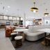 Home2 Suites by Hilton South Padre Island lobby with seating area and breakfast counter